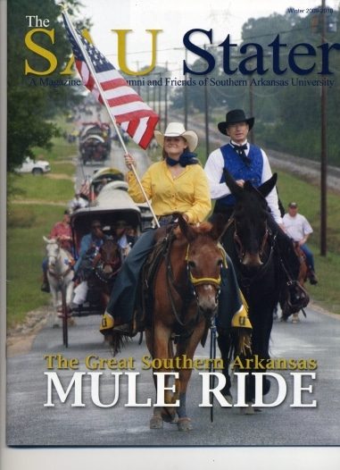 The Great SAU Muleride of 2009 retraces the route of the original 1912 Muleriders. Left to right: the 2009 Mulerider Sunny Wilcox on Molly B and Dr. David F. Rankin, SAU President , lead the mile-long procession of riders. photo