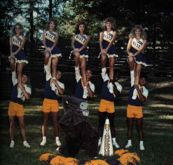 Mulerider mascot in costume with cheerleaders. photo