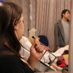 A theatre student, left, gives voice to a "patient" during an exercise to help prepare nursing students for hospital experiences.