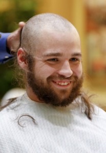 Sigma Pi Head Shaving_Joe Weeks shaves Taylor Harvey